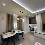 Gold Vollga House Апартаменты